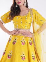 Vibrant Yellow Round Neckline And Short Sleeves Mehndi Designer Lehenga Set