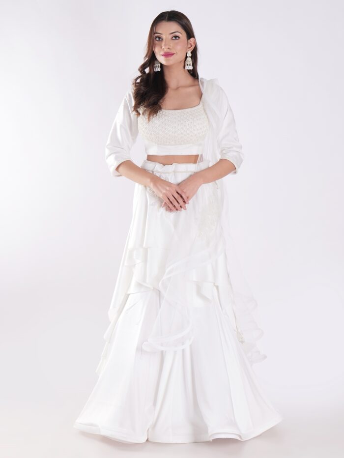 1-20.jpg White Flowing Intricate Layers Of Ruffles Dramatic And Elegant Silhouette Cocktail Lehenga Set - Image 1