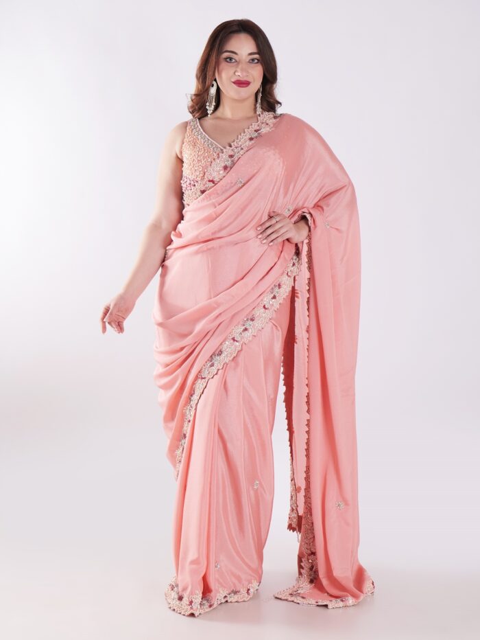 1-34.jpg Peach Colored Party Wear Saree With Intricate Sleeveless Blouse - Image 1