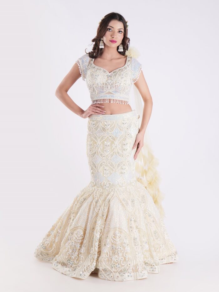 1-9.jpg White And Cream Colored Heavily Embellished With A Sheer Dupatta Fish Cut Lehenga Set - Image 1