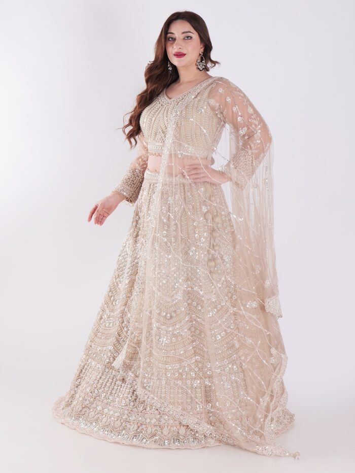 Intricately Designed Cream Colored Luxurious And Elegant Look Party Wear Lehenga Set - Image 3