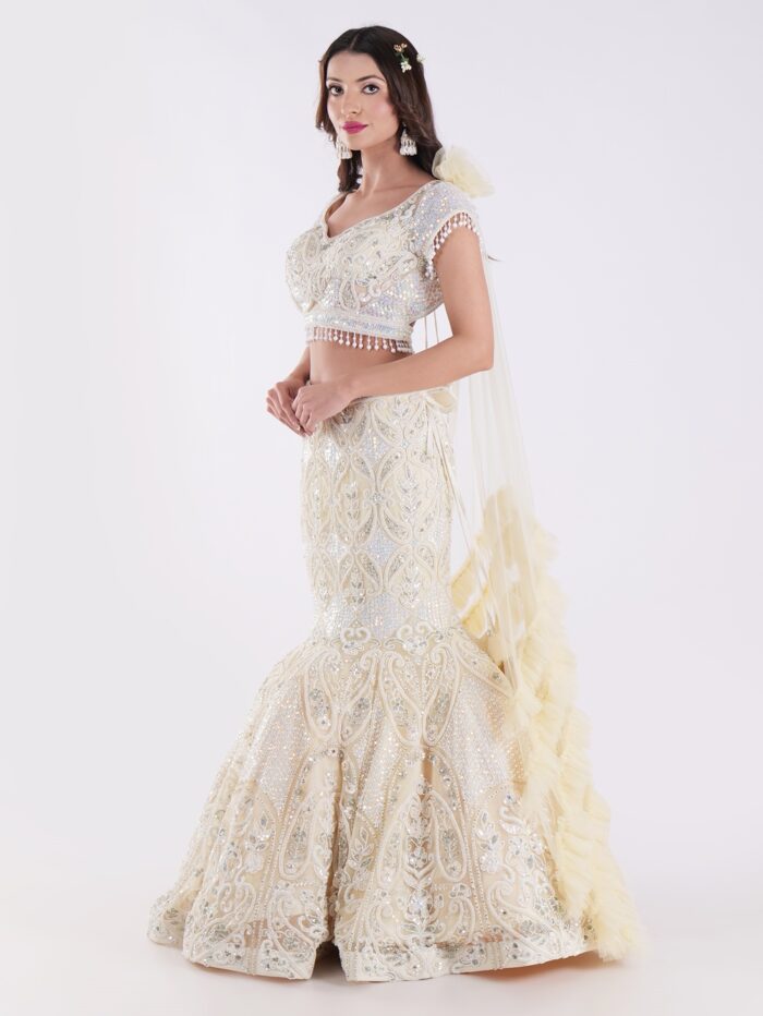 White And Cream Colored Heavily Embellished With A Sheer Dupatta Fish Cut Lehenga Set - Image 3