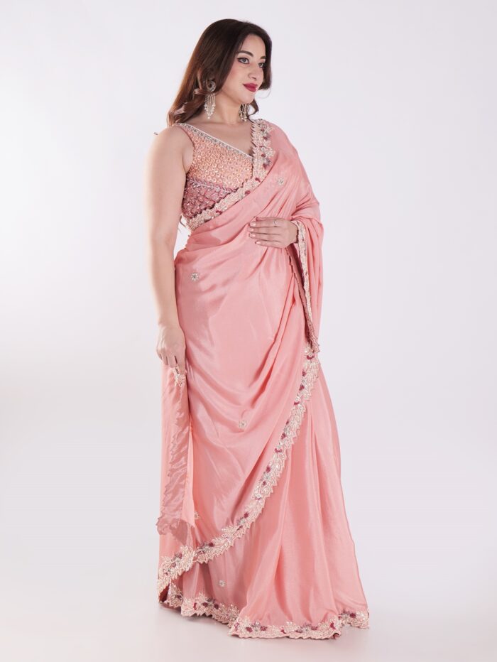 Peach Colored Party Wear Saree With Intricate Sleeveless Blouse - Image 4