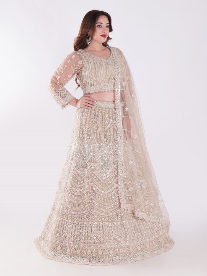 Intricately Designed Cream Colored Luxurious And Elegant Look Party Wear Lehenga Set - Image 4