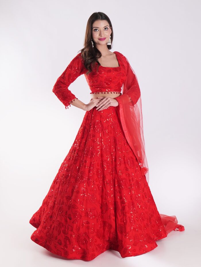 Backdrop Adorned In A Vibrant Red Party Wear Lehenga Choli Set - Image 4