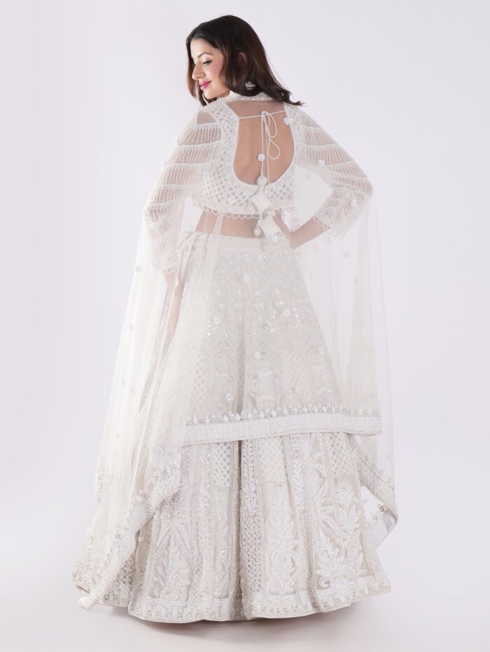 Heavily Embellished With Sequins And Pearls Creating A White Shimmering Effect Bridal Lehenga Choli - Image 5