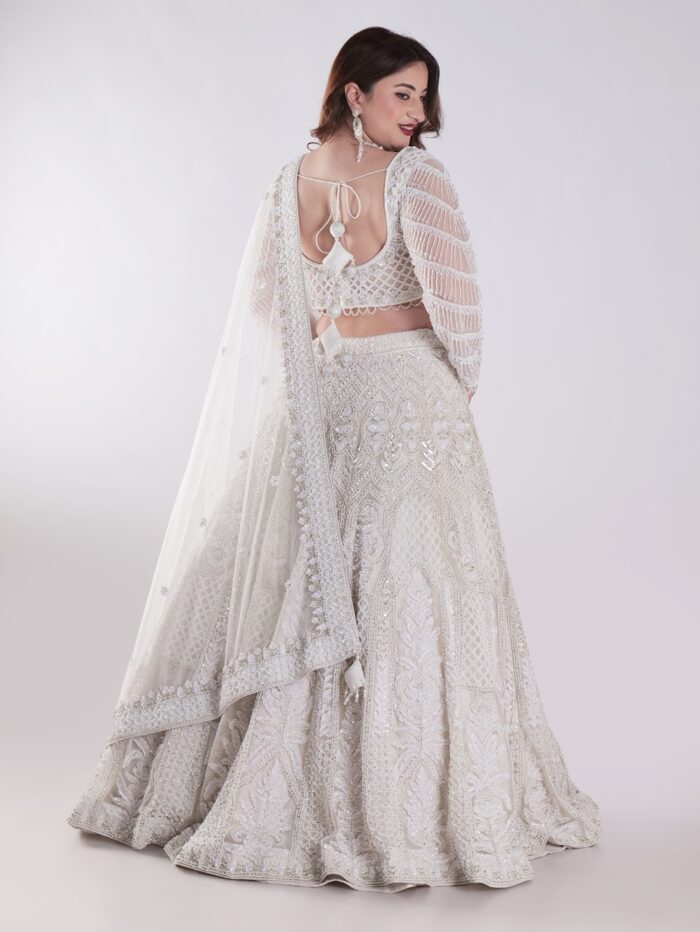 Delicate Floral Patterns And Sparkling Embellishments With Shimmering Effect Engagement Luxury Lehenga Set - Image 5