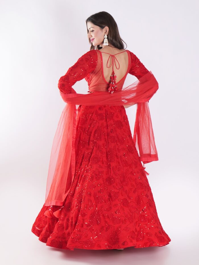 Backdrop Adorned In A Vibrant Red Party Wear Lehenga Choli Set - Image 5