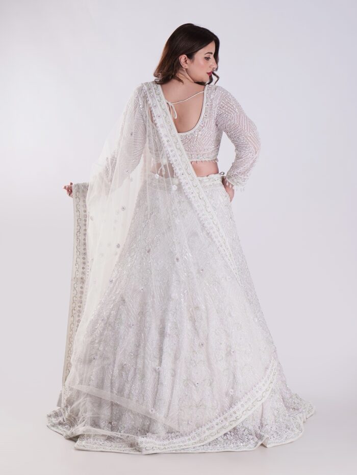 Flowing A-Line Silhouette Adorned With Intricate Beading And Embellishments Luxury Engagement Lehenga Set - Image 5