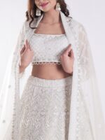 Heavily Embellished With Sequins And Pearls Creating A White Shimmering Effect Bridal Lehenga Choli - Image 6