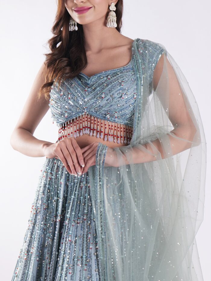 Stunning Blue And Silver Sequined Shimmering Effect Backless Party Wear Lehenga Set - Image 6