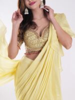 Vibrant Yellow Saree With A Ruffled Design And Golden Embellished Blouse With A Plunging Neckline - Image 6