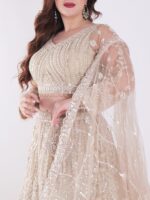 Intricately Designed Cream Colored Luxurious And Elegant Look Party Wear Lehenga Set - Image 6
