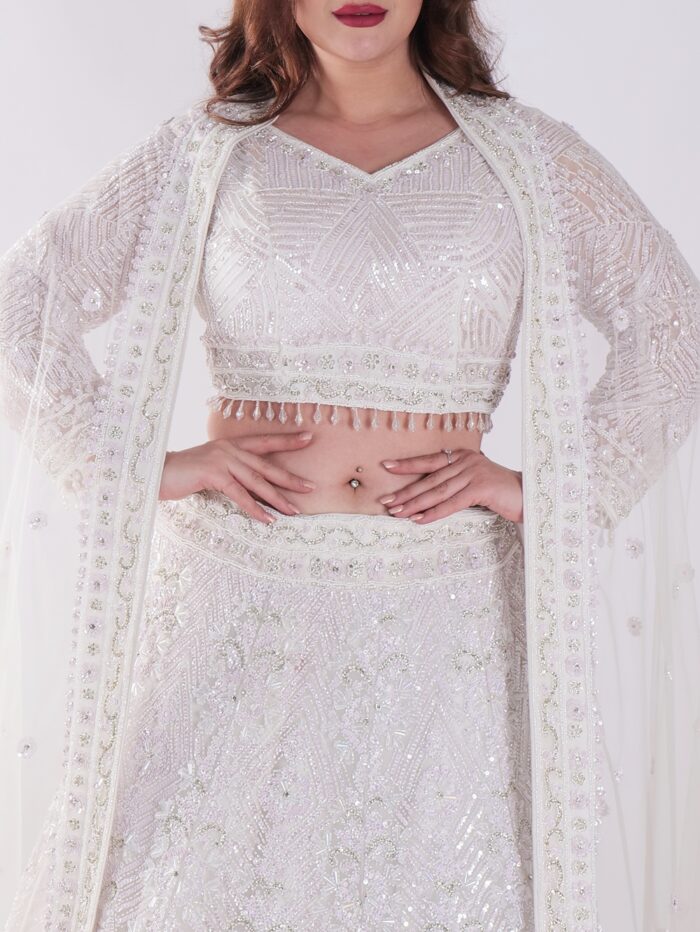 Flowing A-Line Silhouette Adorned With Intricate Beading And Embellishments Luxury Engagement Lehenga Set - Image 6