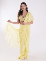Vibrant Yellow Saree With A Ruffled Design And Golden Embellished Blouse With A Plunging Neckline - Image 7