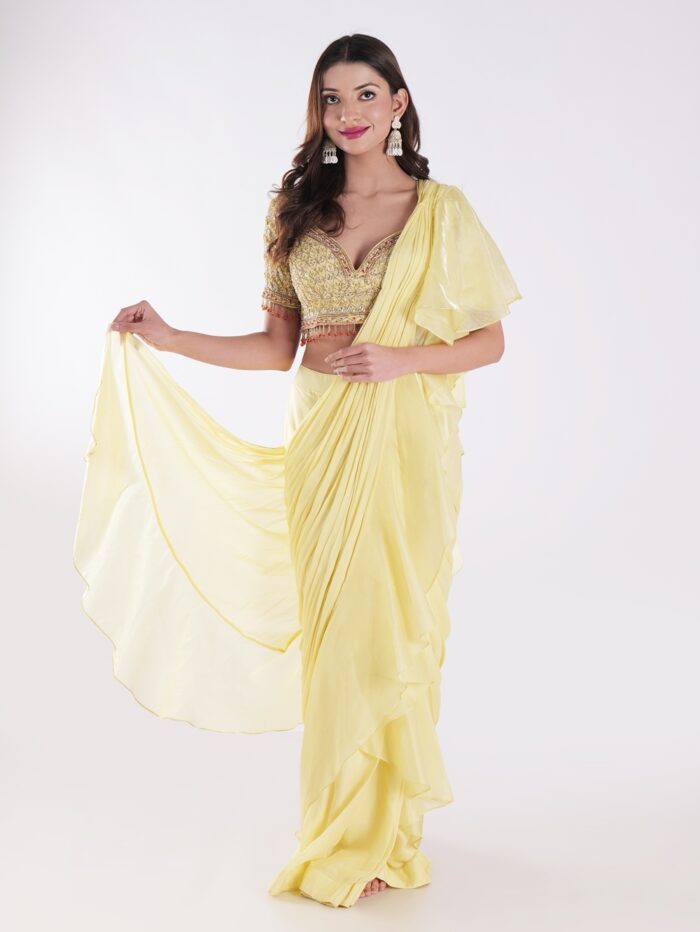 Vibrant Yellow Saree With A Ruffled Design And Golden Embellished Blouse With A Plunging Neckline - Image 7