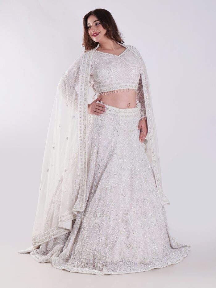 Flowing A-Line Silhouette Adorned With Intricate Beading And Embellishments Luxury Engagement Lehenga Set - Image 7