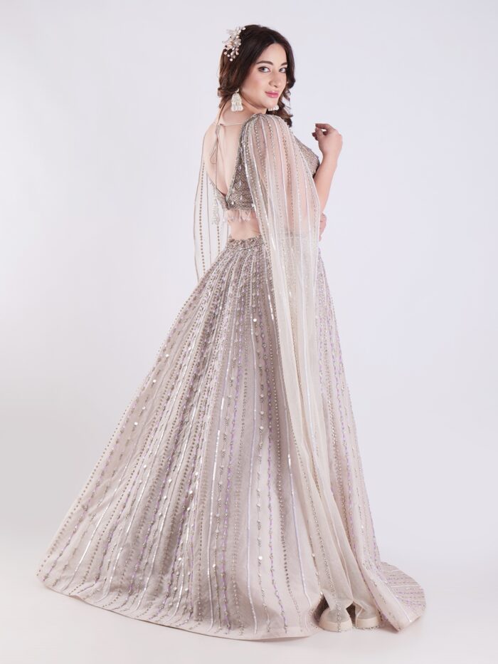 Light Colored Embrace Regal Elegance in This Champagne Sequin Embellished Lehenga Set - Image 7